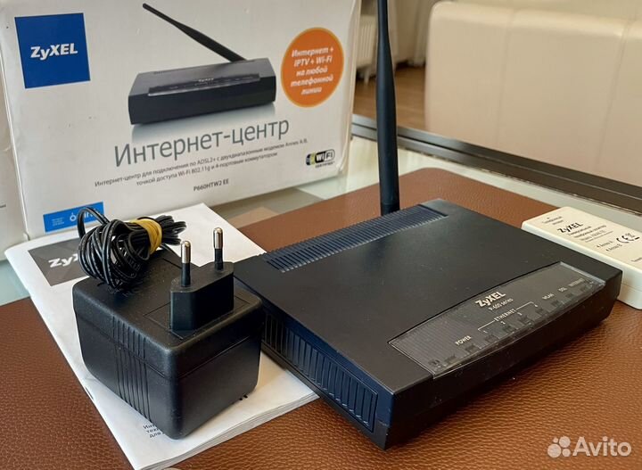 Интернет-центр zyxel P660HTW2 EE (модем, точка дос