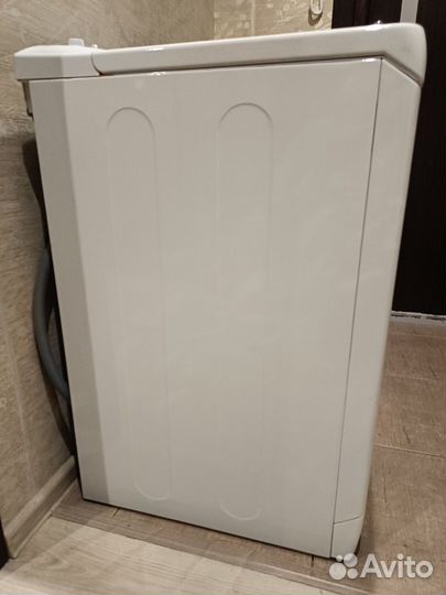 Стиральная машина с вертикальной загрузкой