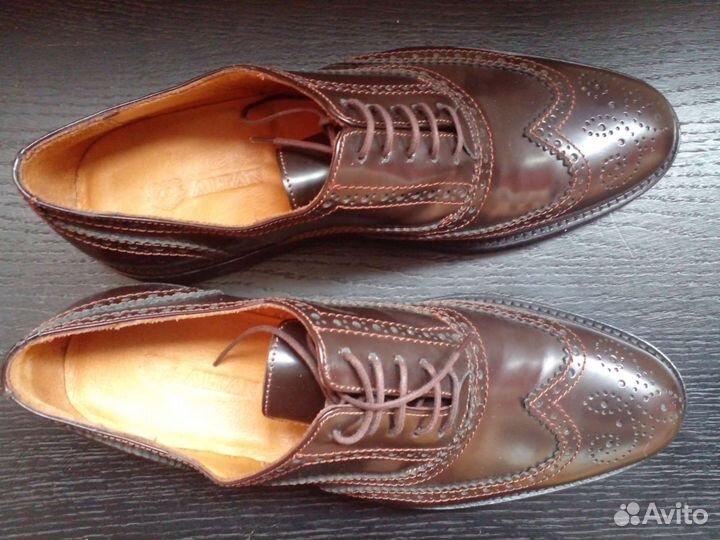 Новые кожаные ботинки