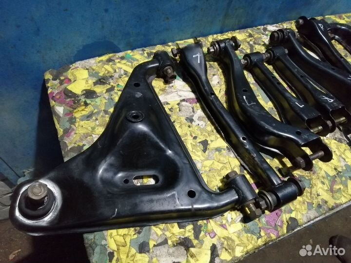 Рычаг задней подвески Nissan Skyline 34