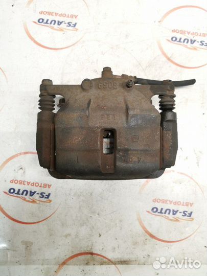 Суппорт тормозной передний левый Nissan Qashqai