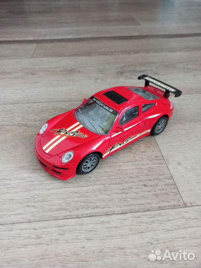 Игрушечная машина porsche