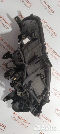 Фара галогеновая передняя левая Mitsubishi Lancer