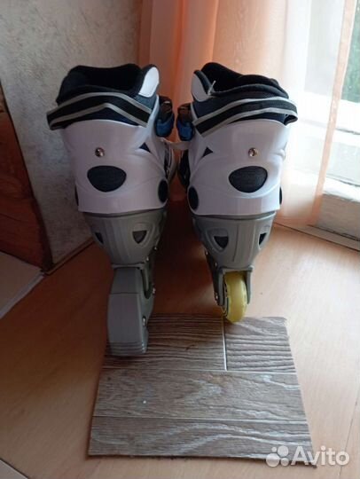 Роликовые коньки