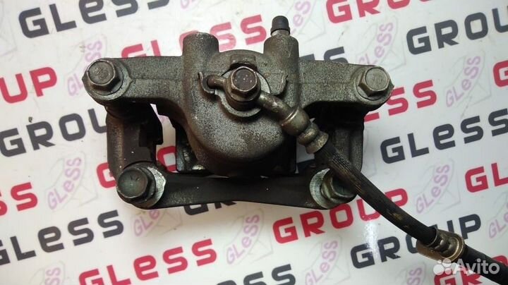 Суппорт передний DE R б/у Demio