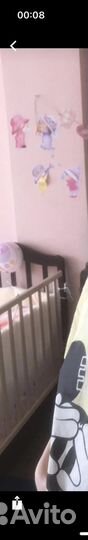 Детская кроватка с маятником