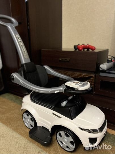 Детская машинка каталка с ручкой