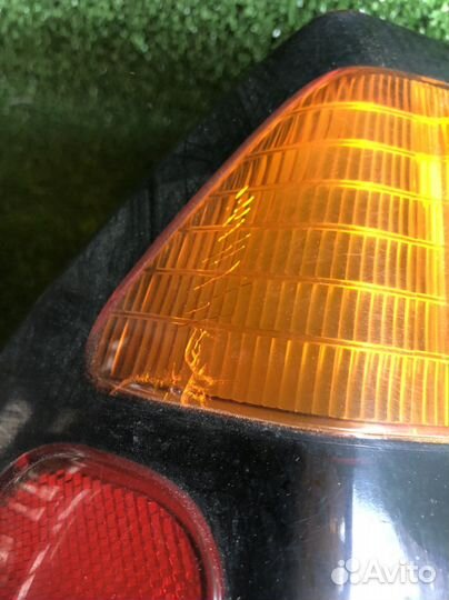 Фонарь левый mitsubishi montero pajero sport