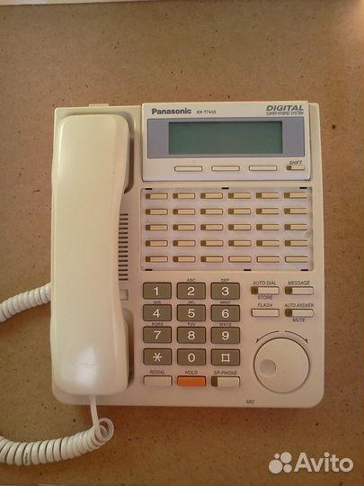 Системный телефон и консоль Panasonic