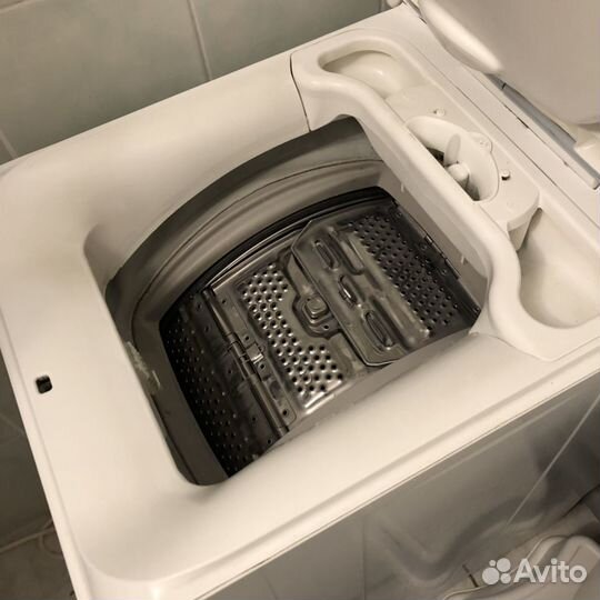 Стиральная машина с вертикальной загрузкой