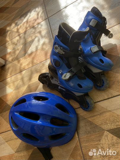 Роликовые коньки