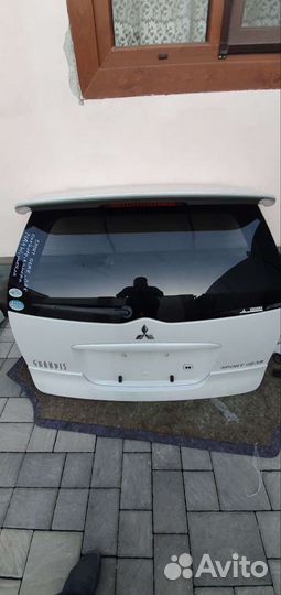 Бампер задний ресталинг на митцубиши грандис спо