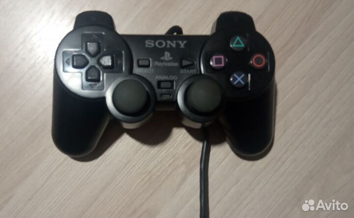 Игровая консоль PlayStation 2 и 2 игры