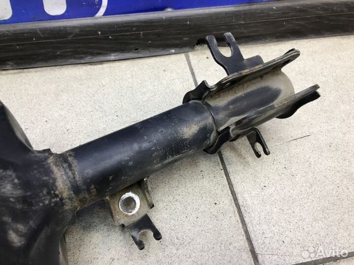 Амортизатор передний правый Chevrolet Aveo T250