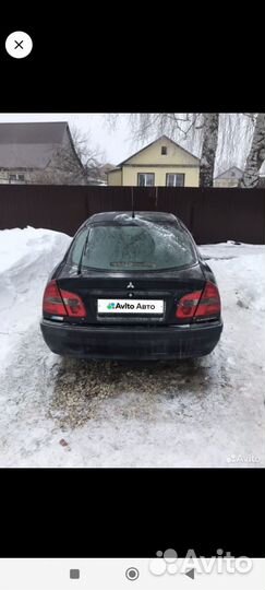 Mitsubishi carisma разбор