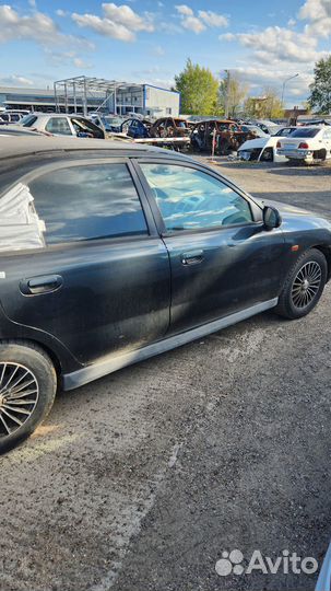 Мицубиши каризма