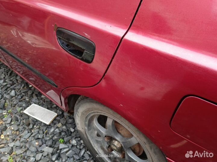 Крыло заднее левое Hyundai Accent седан G4EC 2005