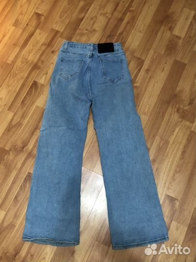 Джинсы клеш женские