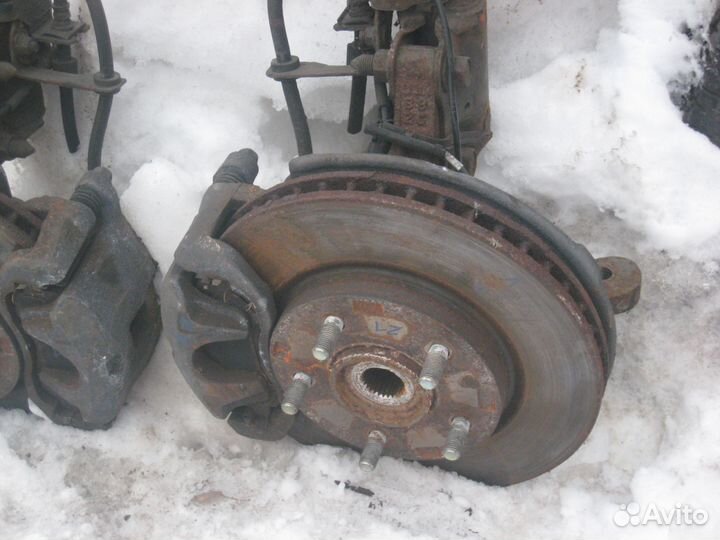 Поворотный кулак Mitsubishi Lancer 10