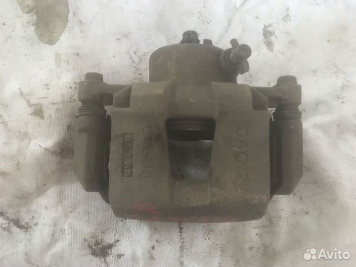 Суппорт тормозной передний левый Chevrolet Lacetti