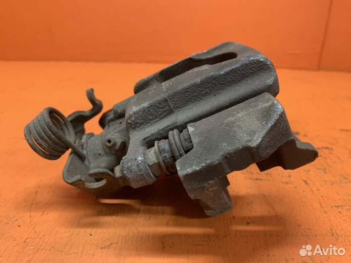 Суппорт тормозной задний левый Ford Explorer U502