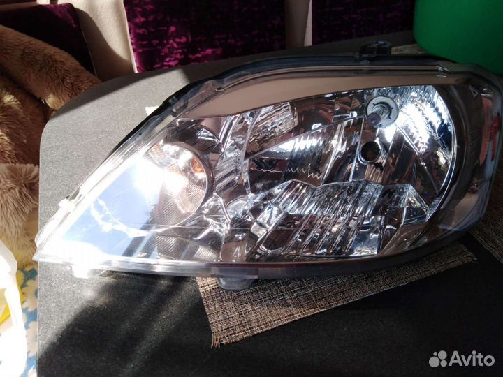 Фара левая Reno Logan 1