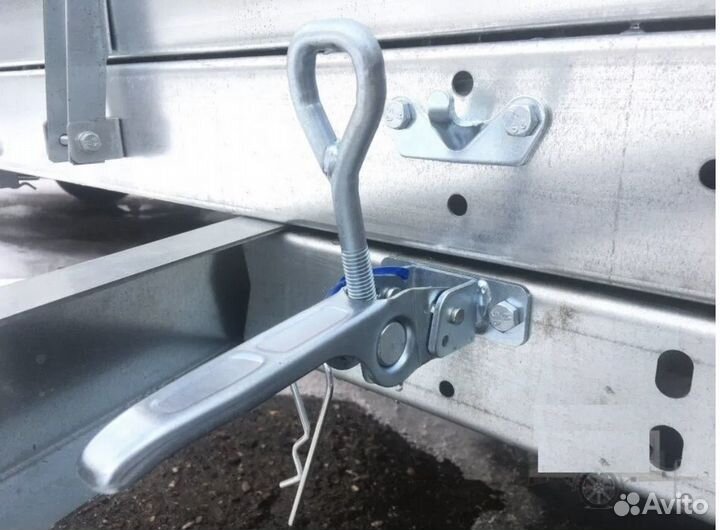 Защелка опракидования для кузова бортового прицепа