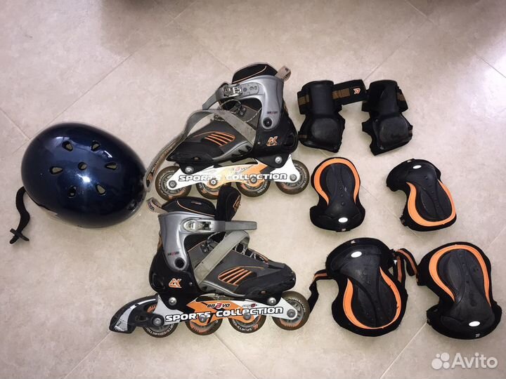 Роликовые коньки