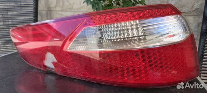 Задний фонарь левый kia rio