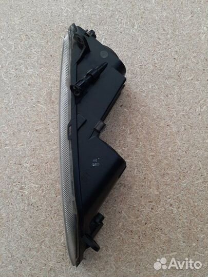 Фара противотуманная левая Volkswagen Passat B7