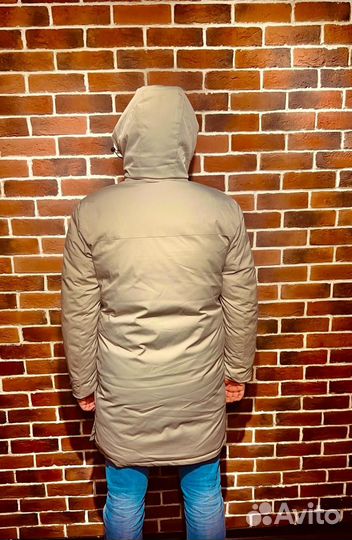 Зимний мужской пуховик бежевого цвета от Stone Island