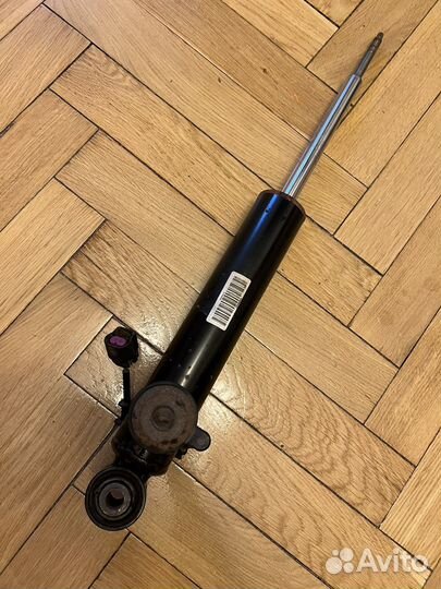 Амортизатор задний левый Cadillac SRX2