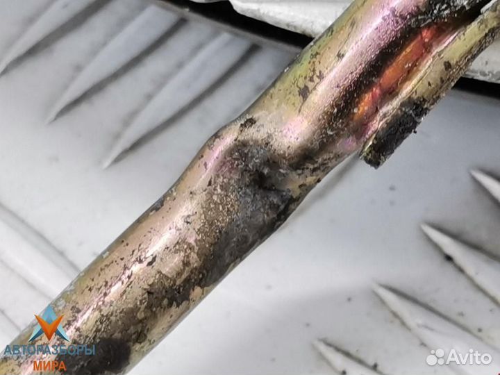 Форсунка Nissan Almera N16 рест. 2004 166009F600