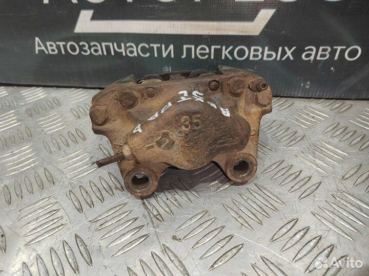 Суппорт тормозной задний левый Opel Vectra B