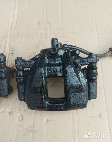 Суппорт тормозной передний Хонда CR-V3 RE