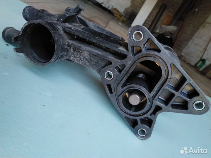 Корпус термостата caxa 1.4 TSI