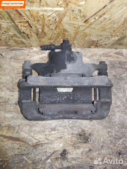 Суппорт тормозной передний левый Opel Astra J