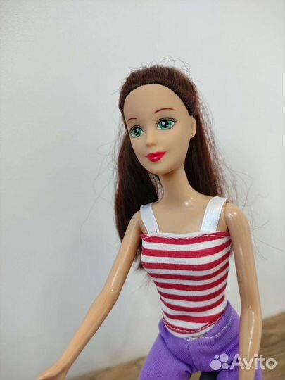 Барби на велосипеде