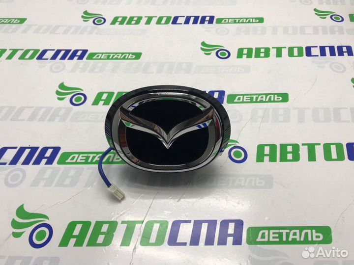 Эмблема крышки багажника Mazda 3Bp хетчбек 5D