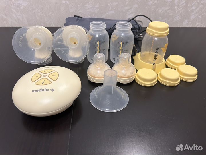 Молокоотсос medela swing maxi электрический