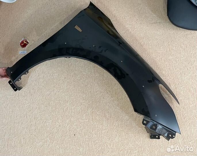 Крыло переднее правое Mitsubishi L200 5220K094