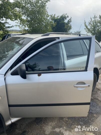 Дверь передняя левая skoda octavia a4