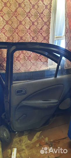 Дверь задняя правая для Nissan Almera