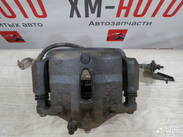 Суппорт тормозной передний левый KIA Sportage 3 SL