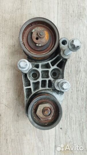 Натяжитель ремня грм Opel Omega