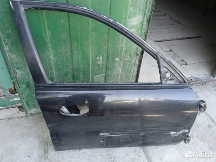 Дверь передняя левая lanos