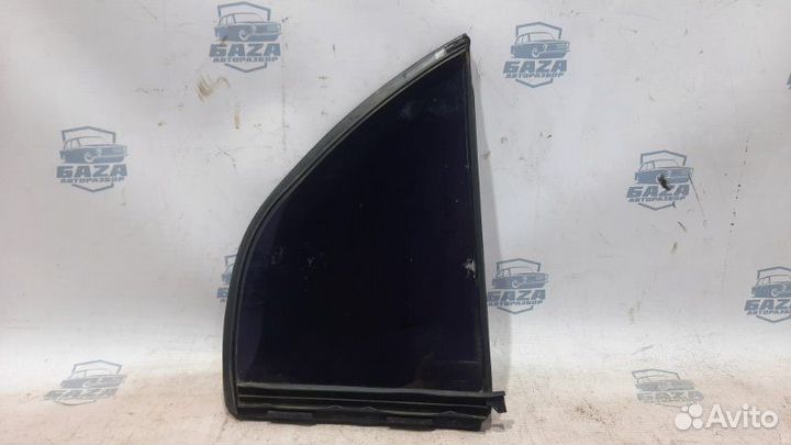 Стекло двери заднее левое Mitsubishi Eterna E52