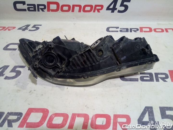 Фара головного света левая б/у для Honda Civic (33