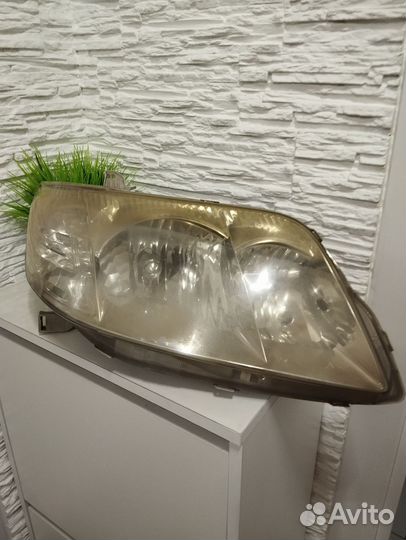 Фара toyota corolla 120
