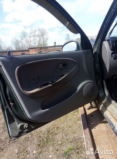 Дверные карты киа рио универсал 2002г